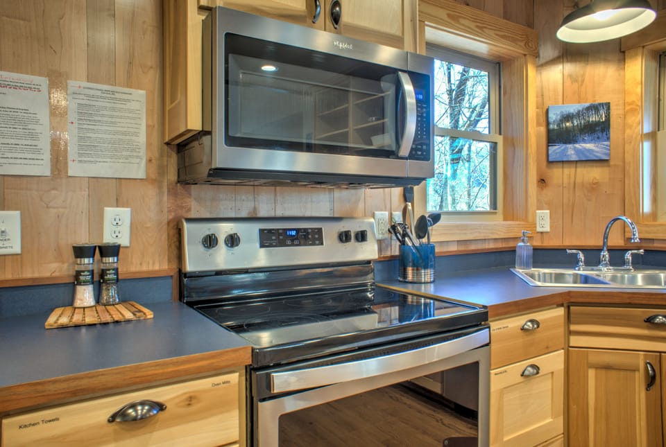 Kitchen is outfitted with an Electric Range