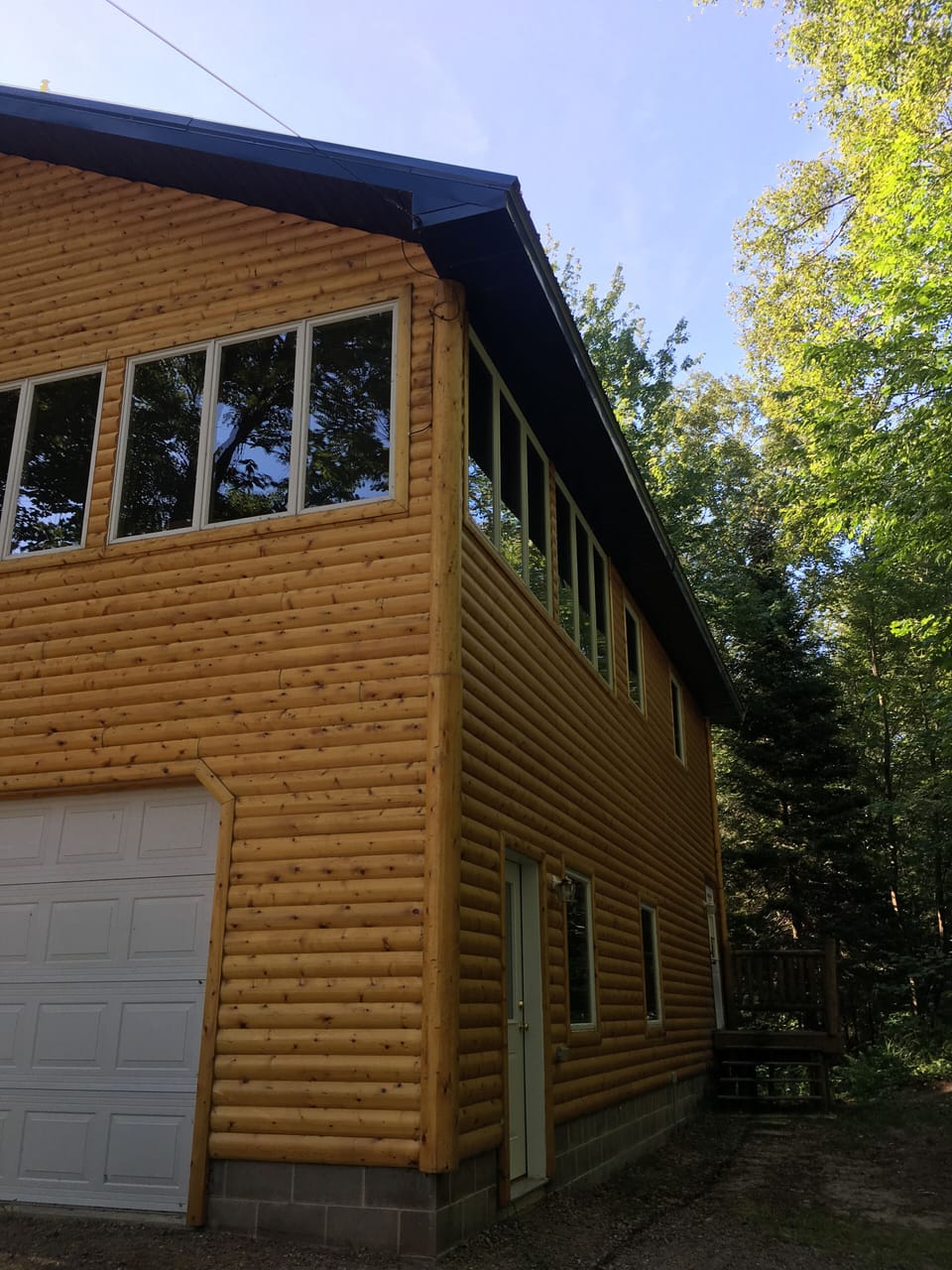 Living quarters on second floor. Garage below