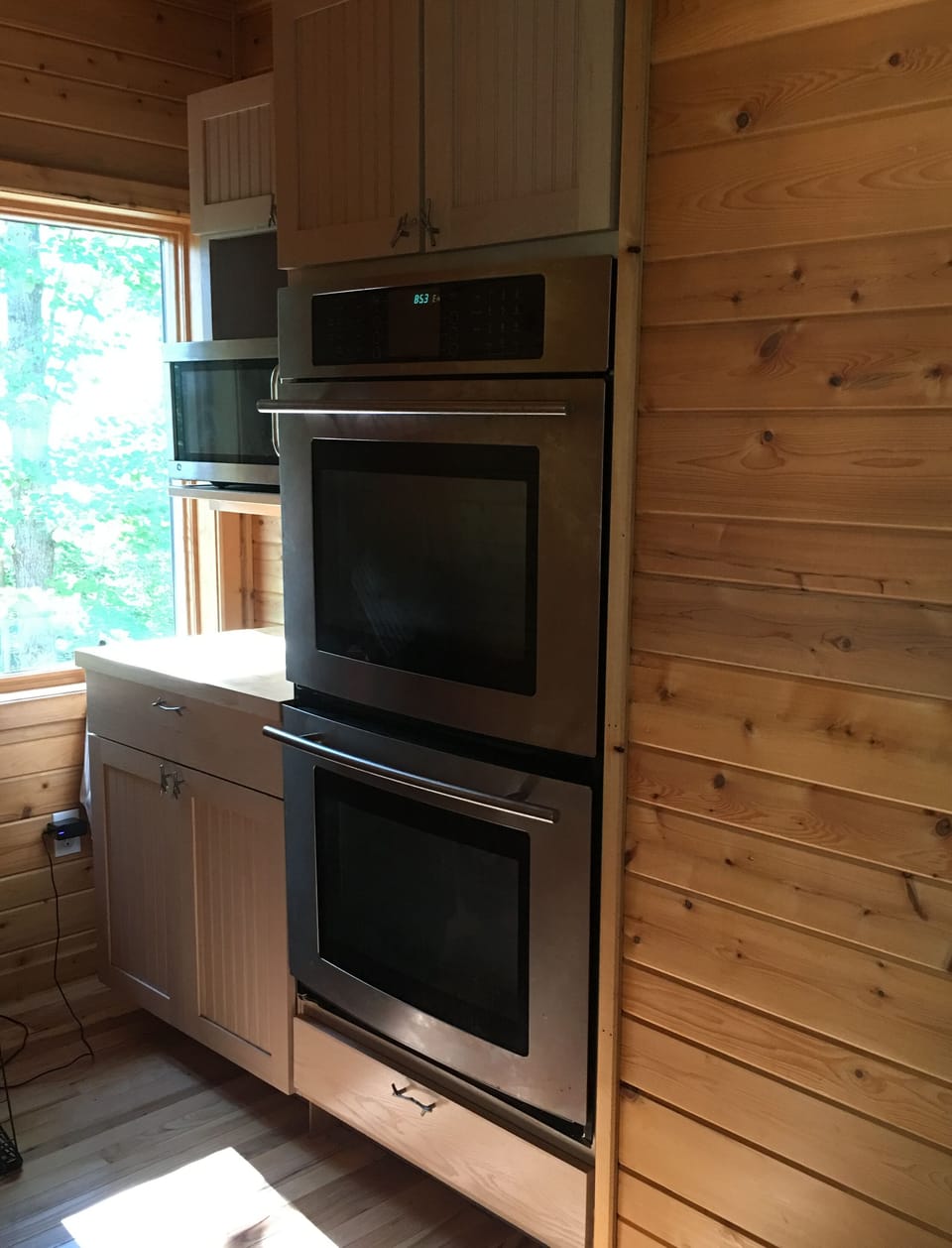 Butlers pantry with double oven and microwave 