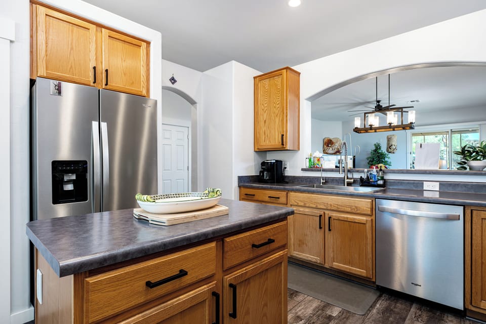 From morning coffee to meals, this roomy kitchen has everything you need.