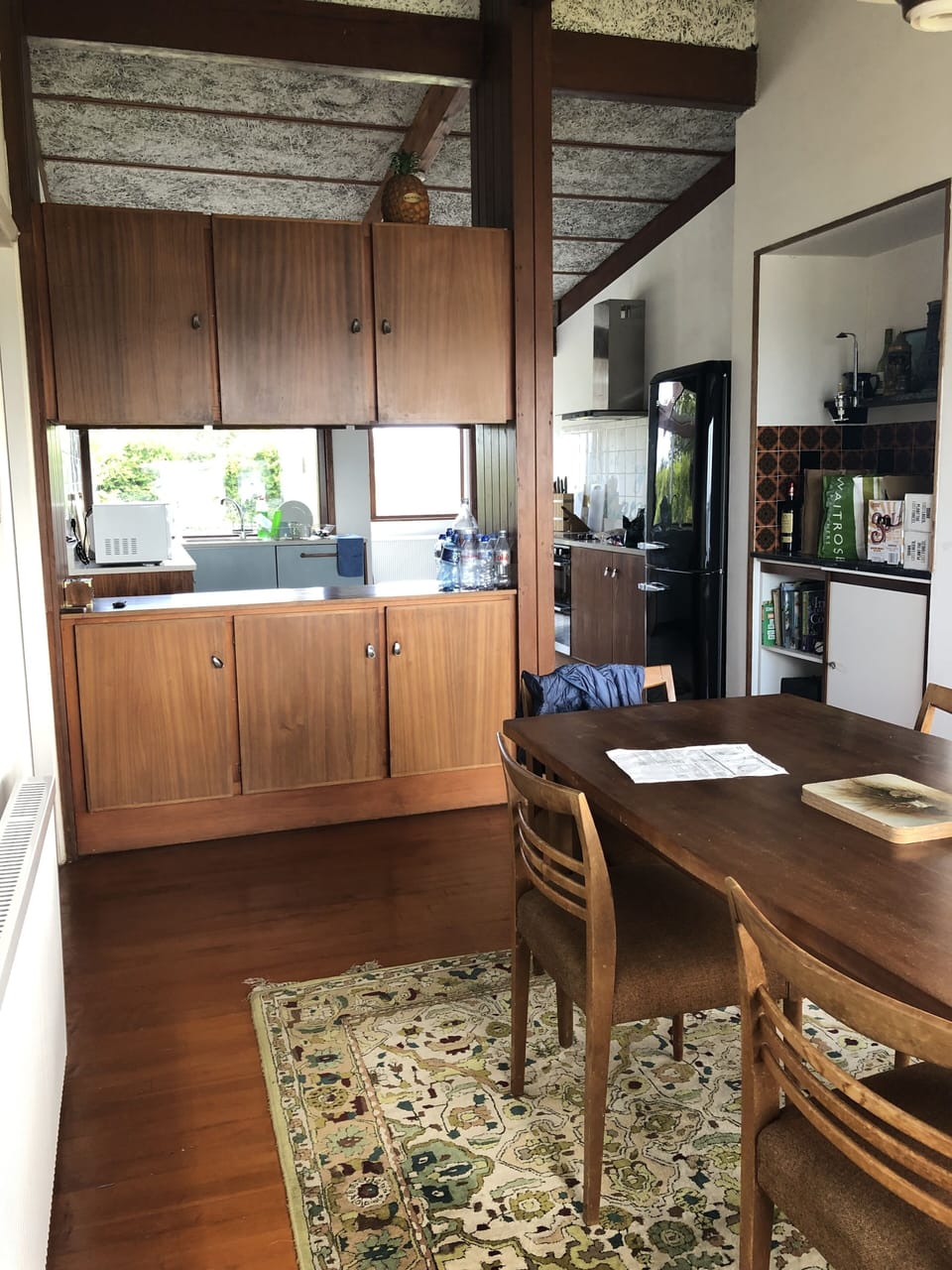 looking at Bar and kitchen from dining area