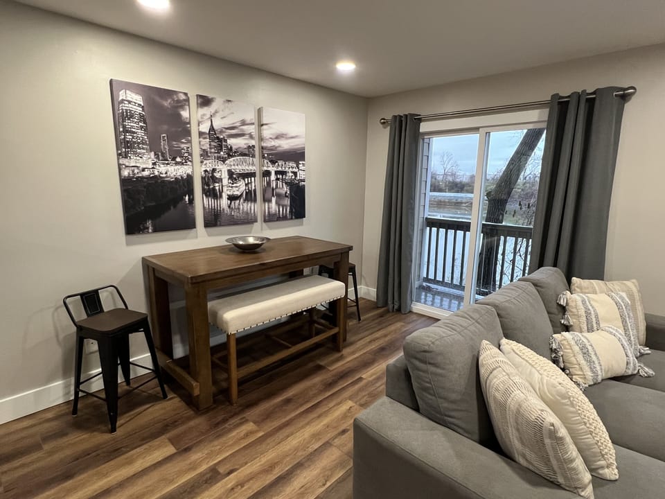 Living Room with Eating Area & Private Balcony
