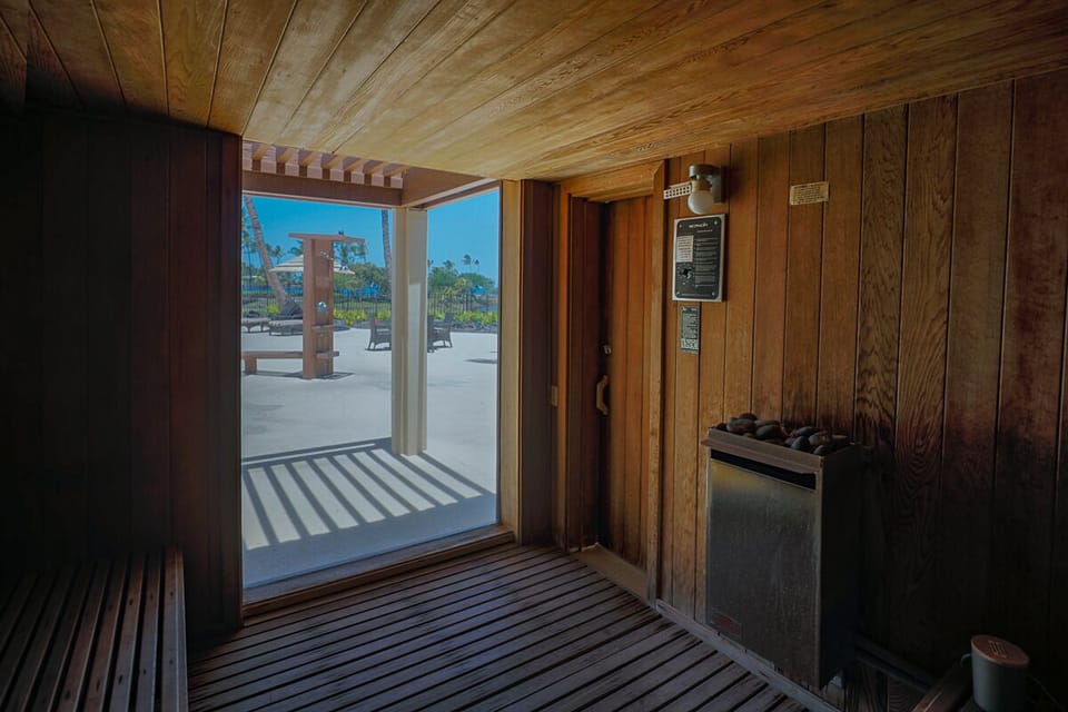 Rejuvenate in the dry sauna with a peaceful view of the tropical grounds.