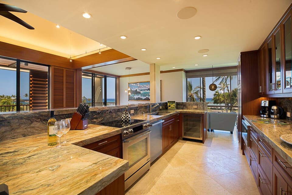 Whip up island-inspired meals in this fully renovated kitchen with modern appliances and granite countertops.