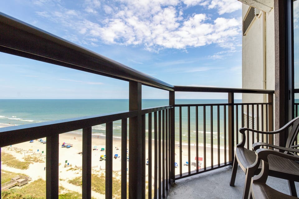 Transform the balcony into your oceanfront lounging deck, with comfortable seating and a wide-open view of the sea for a perfect relaxation spot.