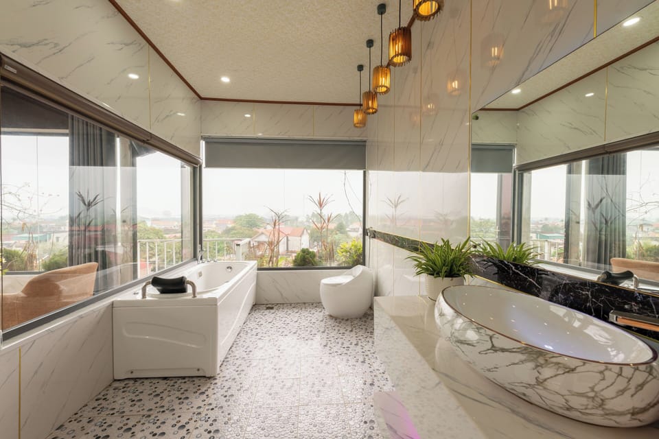 Deluxe Double Room, City and  Mountain View, Bathtub, Balcony | Bathroom | Separate tub and shower, rainfall showerhead, free toiletries