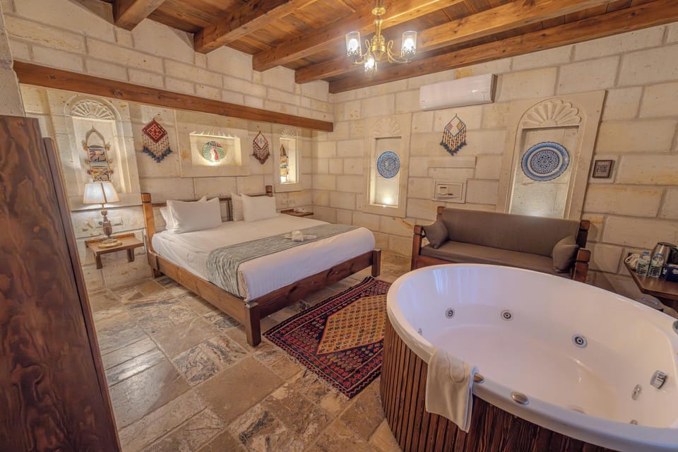 Room (Superior Stone Room 304) | Minibar, in-room safe, soundproofing, iron/ironing board