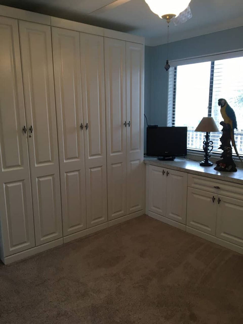 Guest bedroom with plenty of storage.