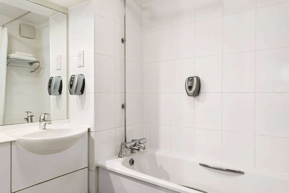 Combined shower/tub, eco-friendly toiletries, hair dryer, towels