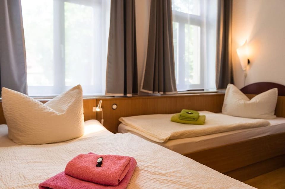 Double Room | Minibar, blackout drapes, free cribs/infant beds, free WiFi