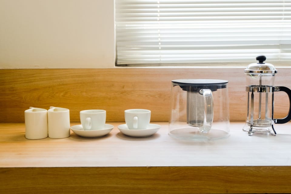 Room | Private kitchenette | Fridge, stovetop, cookware/dishes/utensils