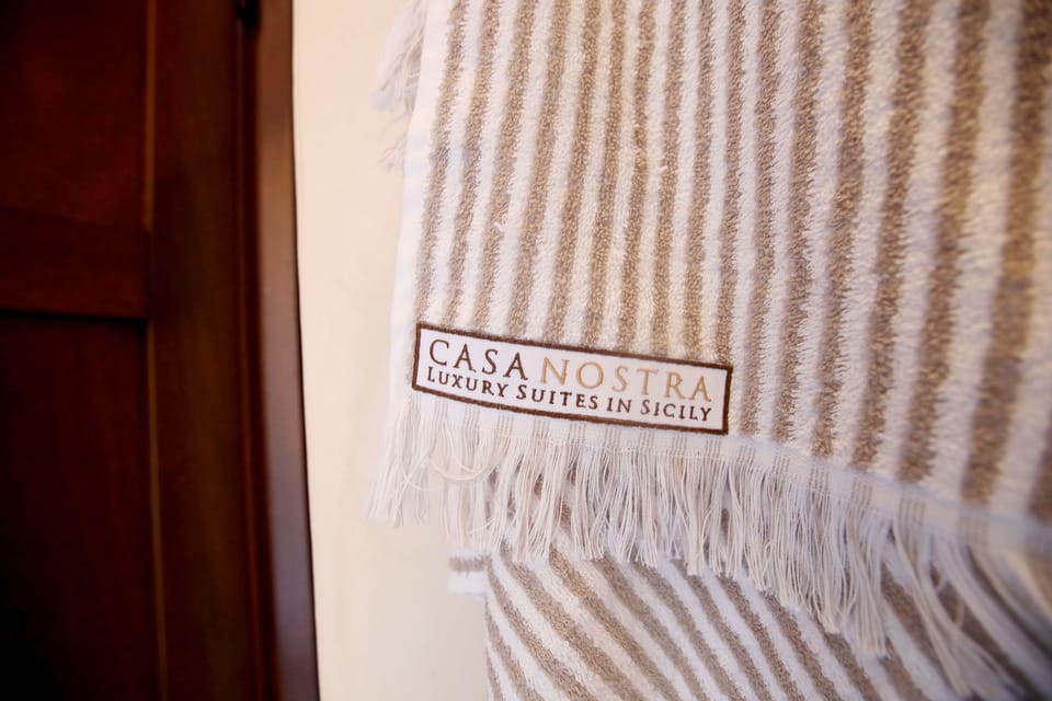Deluxe Room, Balcony (Valledolmo) | Bathroom | Shower, rainfall showerhead, slippers, bidet