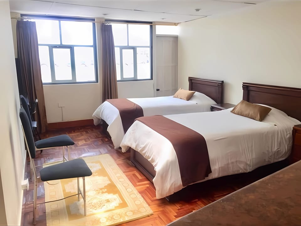 Superior Apartment, 2 Twin Beds, Kitchen | Hypo-allergenic bedding available, down comforters, pillowtop beds