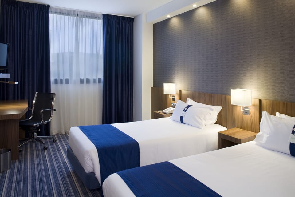 Premium bedding, down comforters, in-room safe, desk