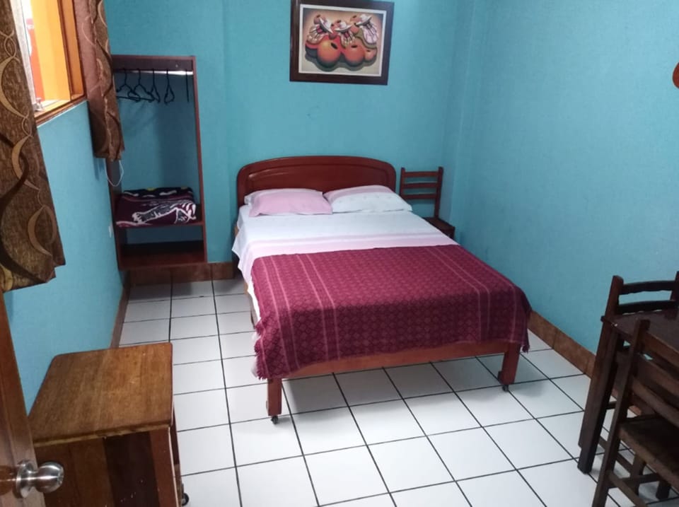 Habitacion Matrimonial con baño privado | Desk, laptop workspace, blackout drapes, iron/ironing board (on request)