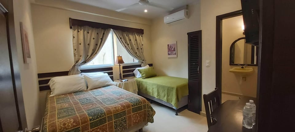 Superior Room, 2 Double Beds | In-room safe, desk, laptop workspace, soundproofing
