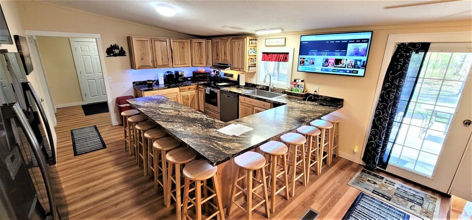 Seats for 22, 
50" 4k Smart TV with wireless keyboard for the fast Internet.
