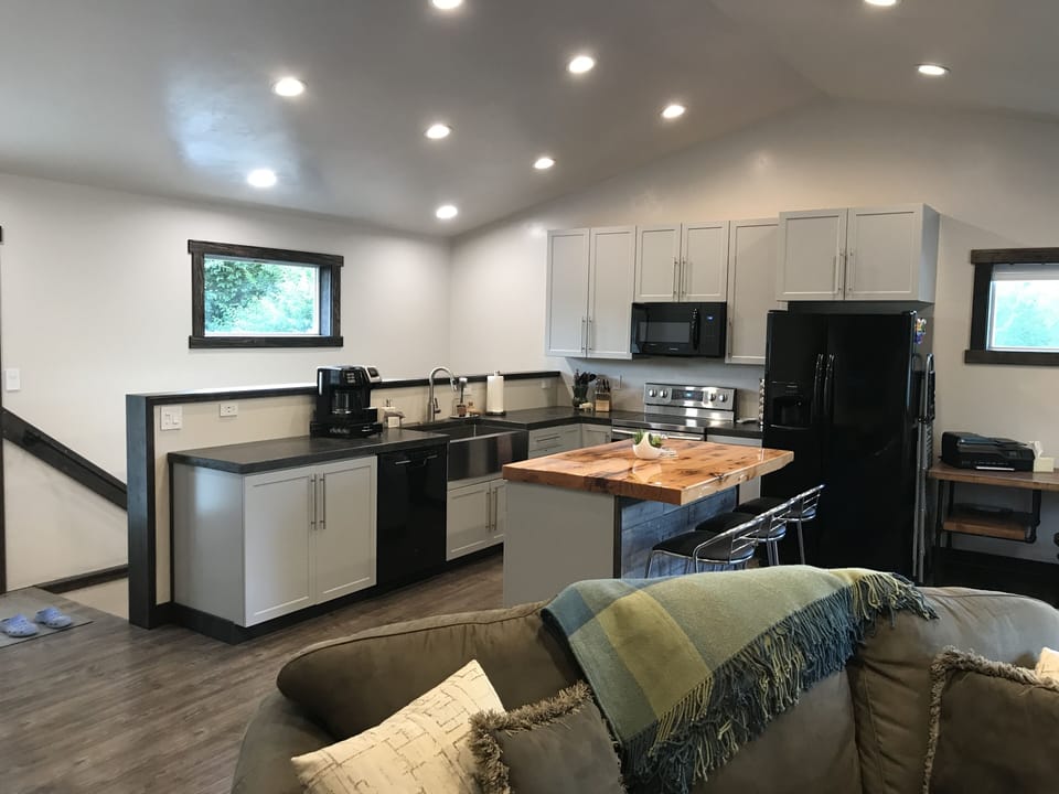 Kitchen/stairway/door to the deck. 