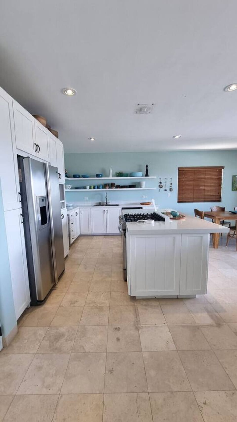 Modern kitchen featuring a spacious island for cooking and gathering.