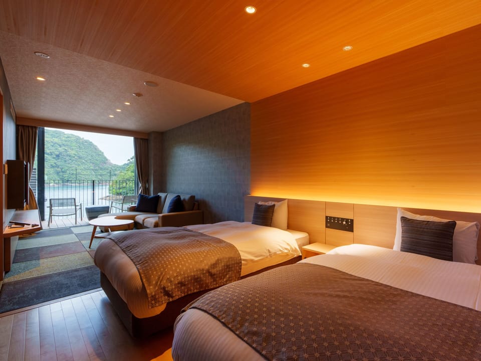 Superior Ocean View Room | Minibar, in-room safe, laptop workspace, blackout drapes