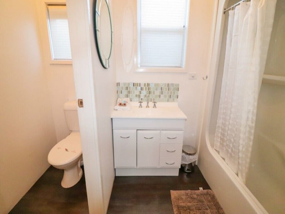 Bathroom with bath and shower