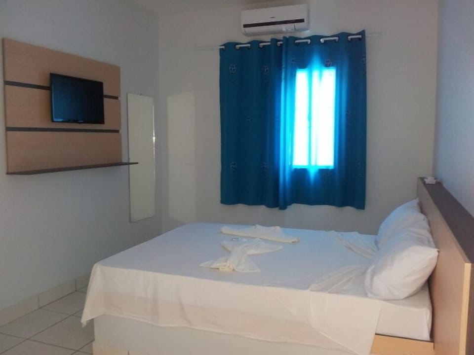 Economy Double Room | Minibar, desk, free WiFi, bed sheets