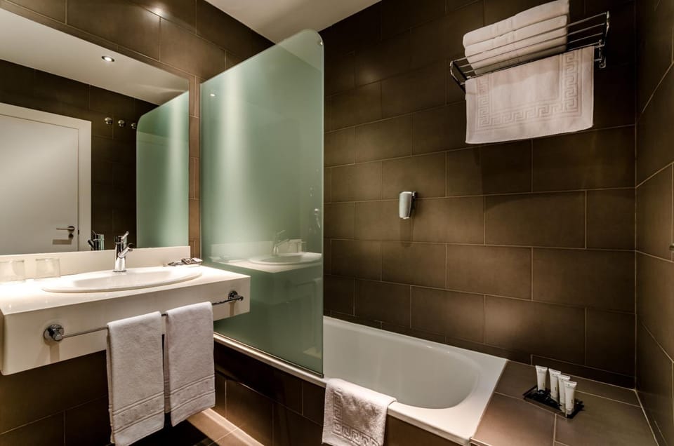 Eco-friendly toiletries, hair dryer, towels, shampoo