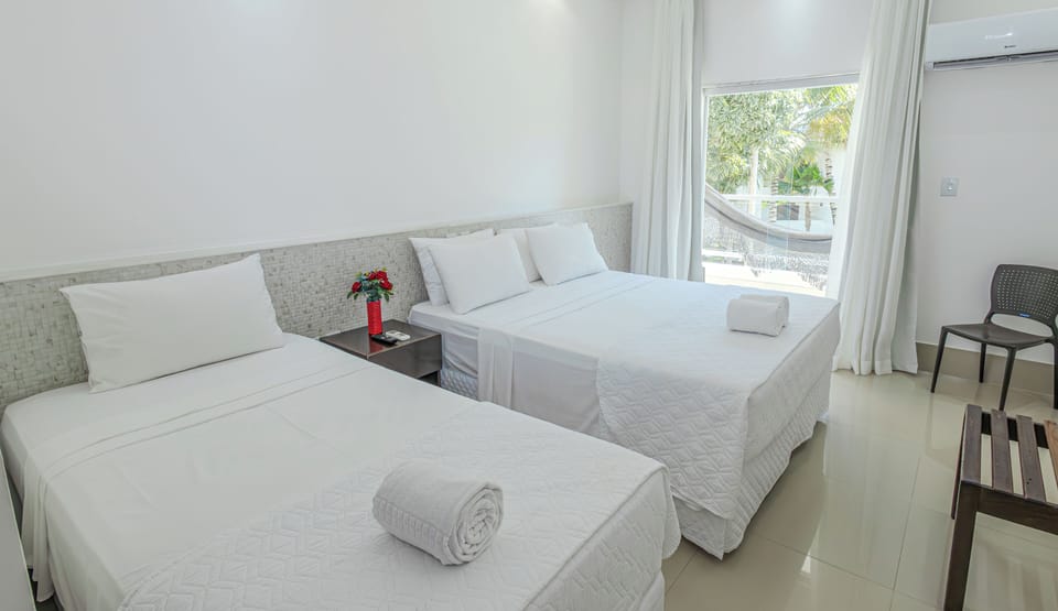 Quarto Triplo Superior | Blackout drapes, free WiFi, bed sheets