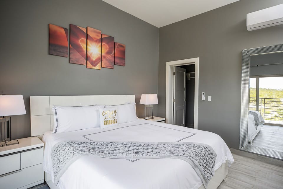 Second Bedroom with pool and sunset views.