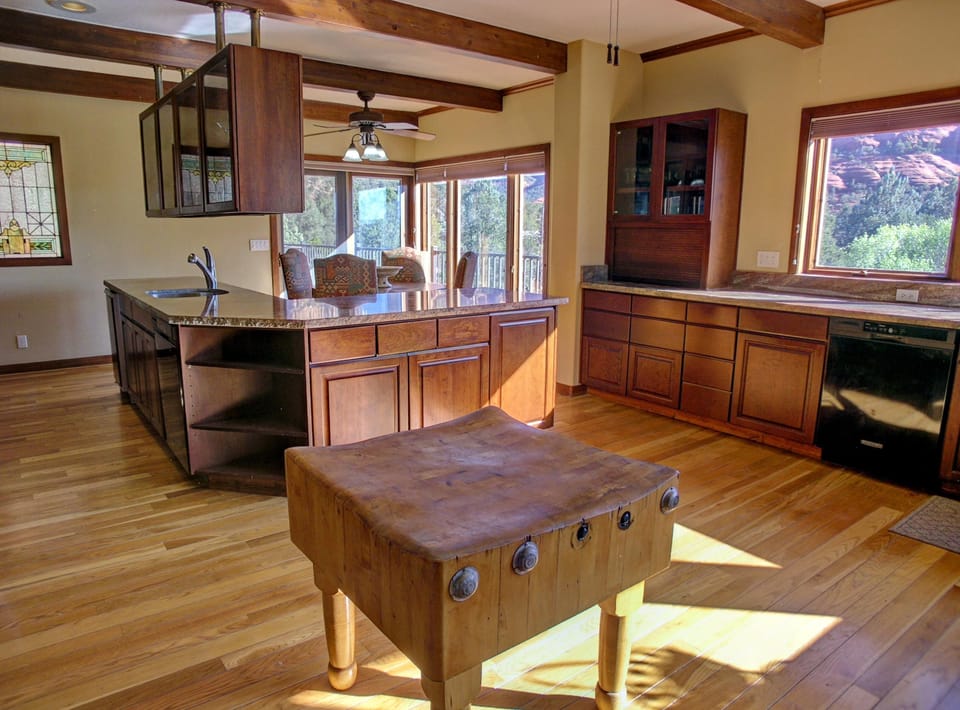 KITCHEN: Spacious room with lots of counter space, 2 refrigerators, 2 dishwashers and a Wolf gas range. Also offers up-close red rock views and  views of the red rock vista to the east named the Mogollon Rim.