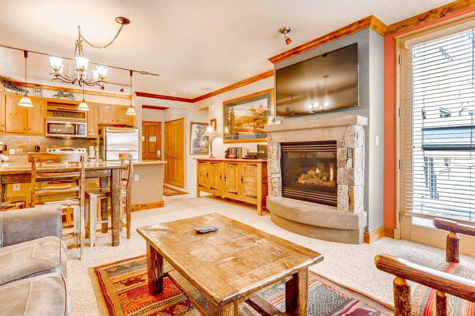 Condo, 1 Bedroom | Living room | Flat-screen TV, fireplace