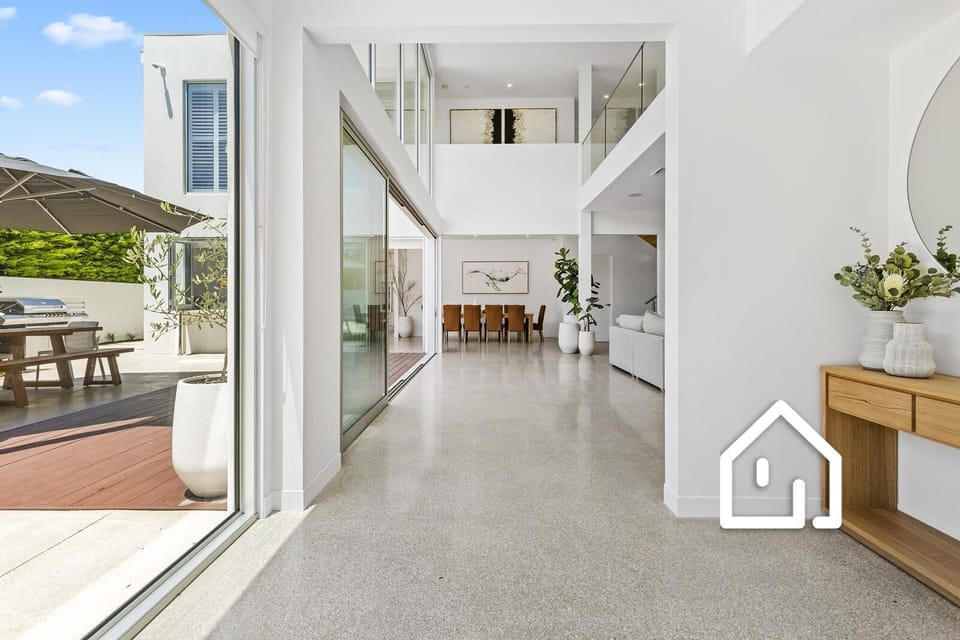 Entrance hallway with stunning north facing double storey windows