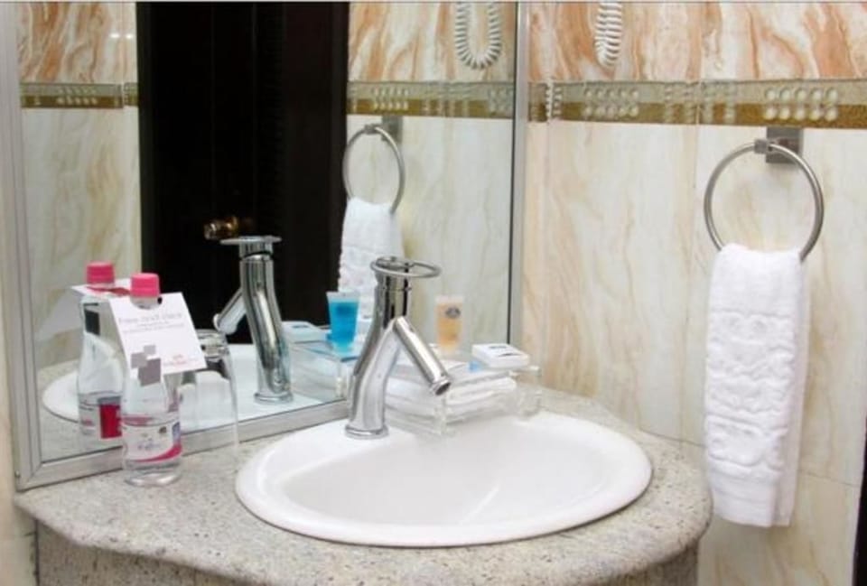 Shower, free toiletries, towels, soap