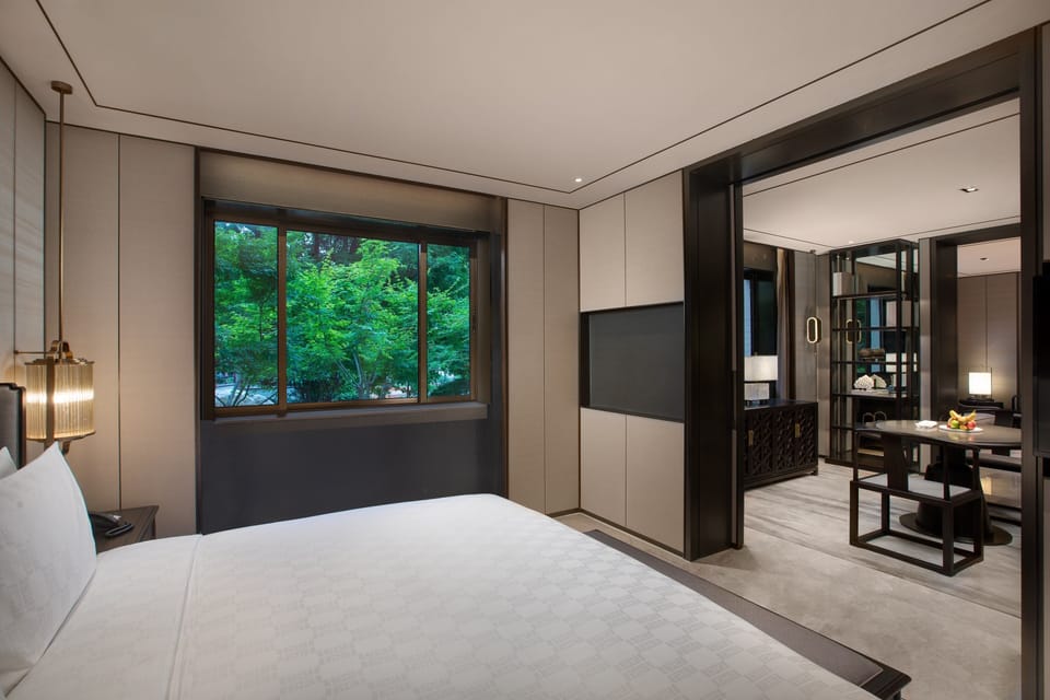 Premium bedding, down comforters, pillowtop beds, minibar