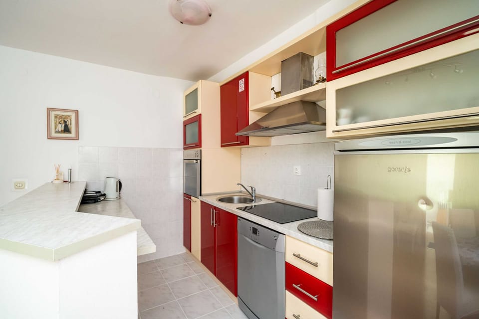 Apartment (Two-Bedroom Apartment with Balcony) | Private kitchen | Fridge, dishwasher, cookware/dishes/utensils