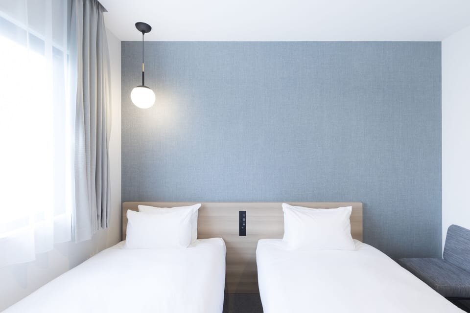Twin Room | In-room safe, iron/ironing board, free WiFi, bed sheets