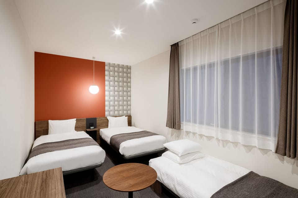 Twin Room with Sofa bed | Iron/ironing board, free WiFi, bed sheets