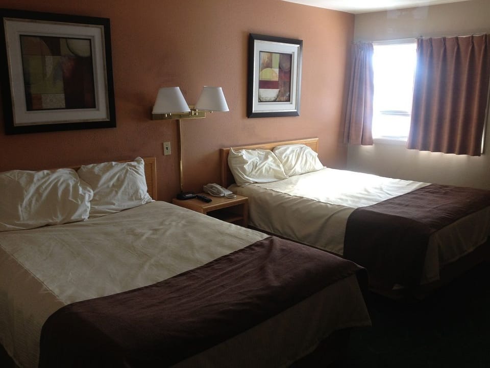 Pillowtop beds, desk, iron/ironing board (on request), WiFi (free)