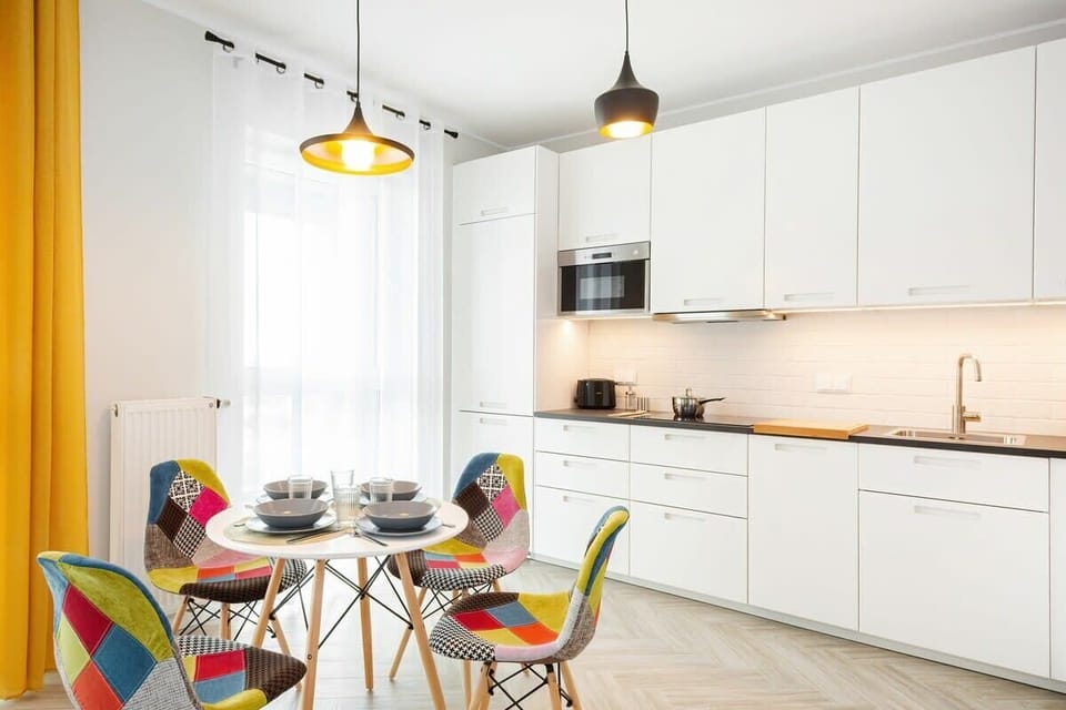 Bright kitchenette with dining table.