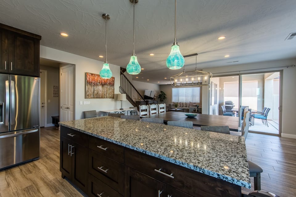 Kitchen Island, Dining Table, Patio Table and Living Room.