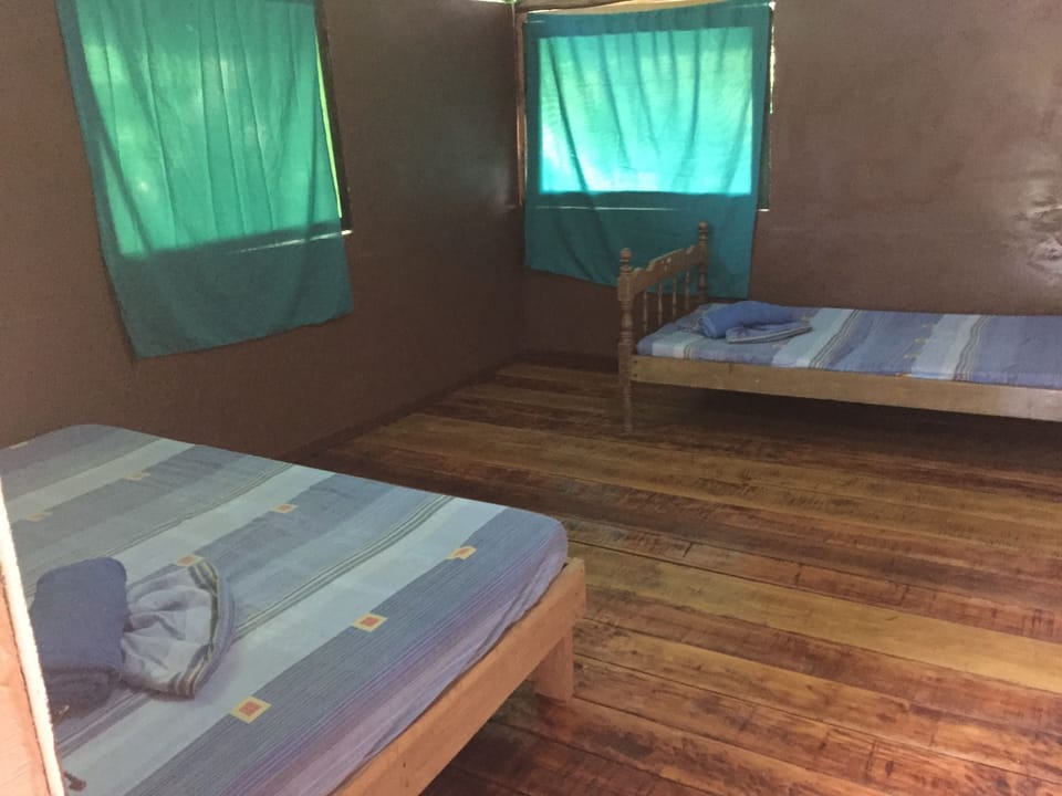 Economy Triple Room | Laptop workspace, WiFi (free), bed sheets