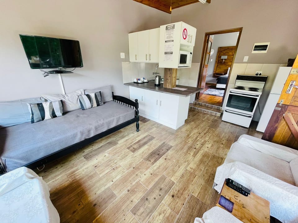 Comfort Studio | Living area | 32-inch LCD TV with cable channels, TV