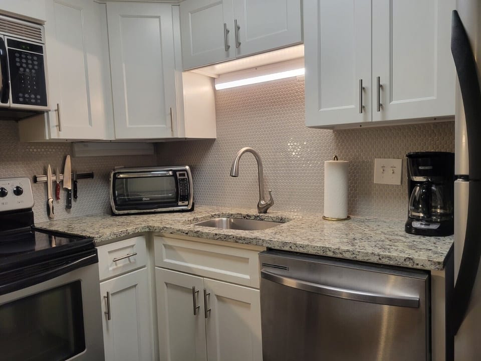 New modern kitchen cabinets with granite countertops