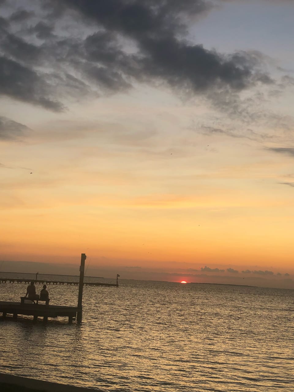 breathtaking sunset views from the balconies or from the pier across the street