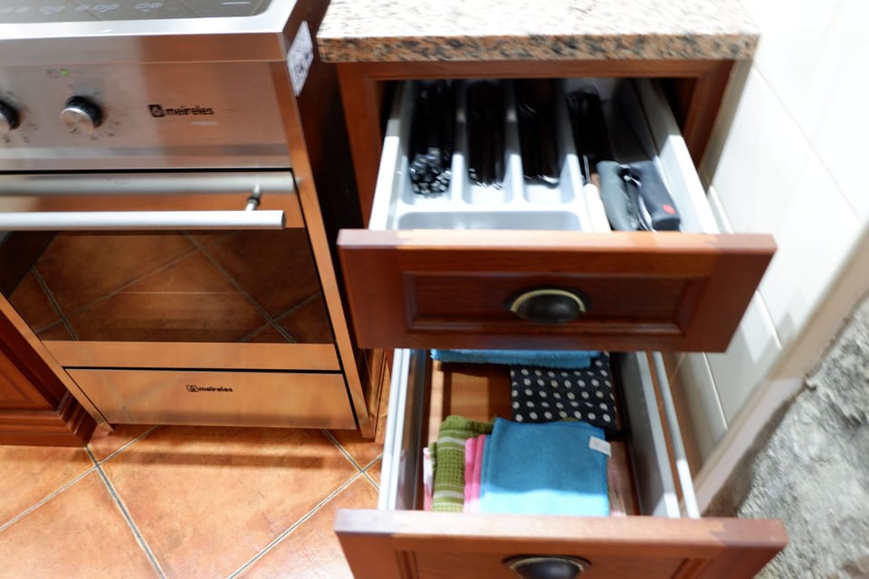 Dish towels drawer with table mats Utensils to whip up a storm of a meal 