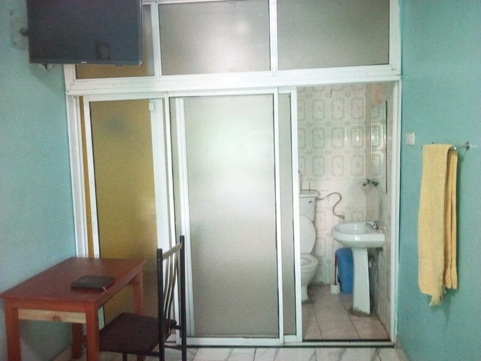 Double or Twin Room | Bathroom | Shower, slippers, towels, soap