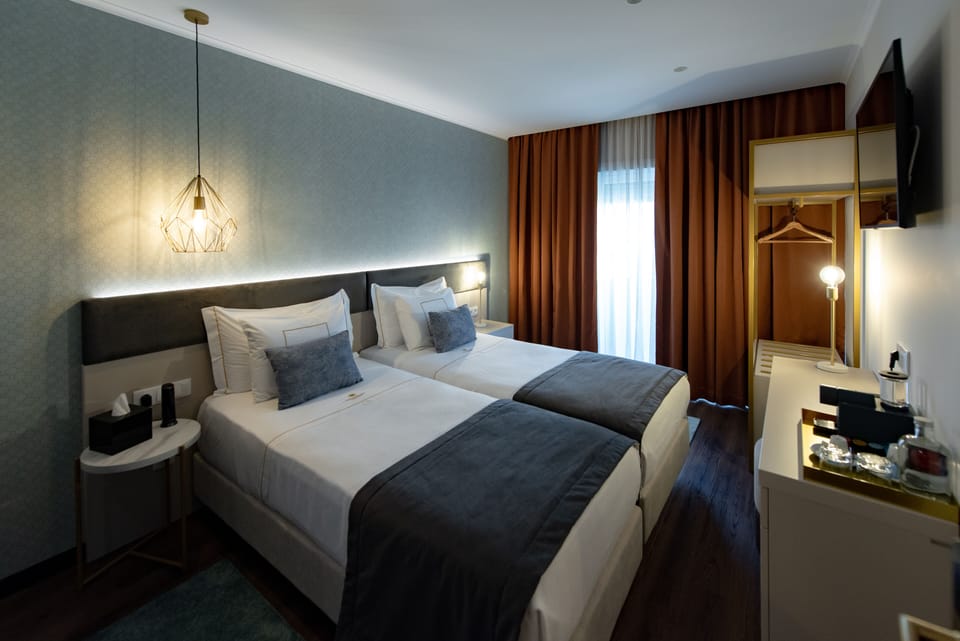 Standard Twin Room | Desk, blackout drapes, soundproofing, free WiFi