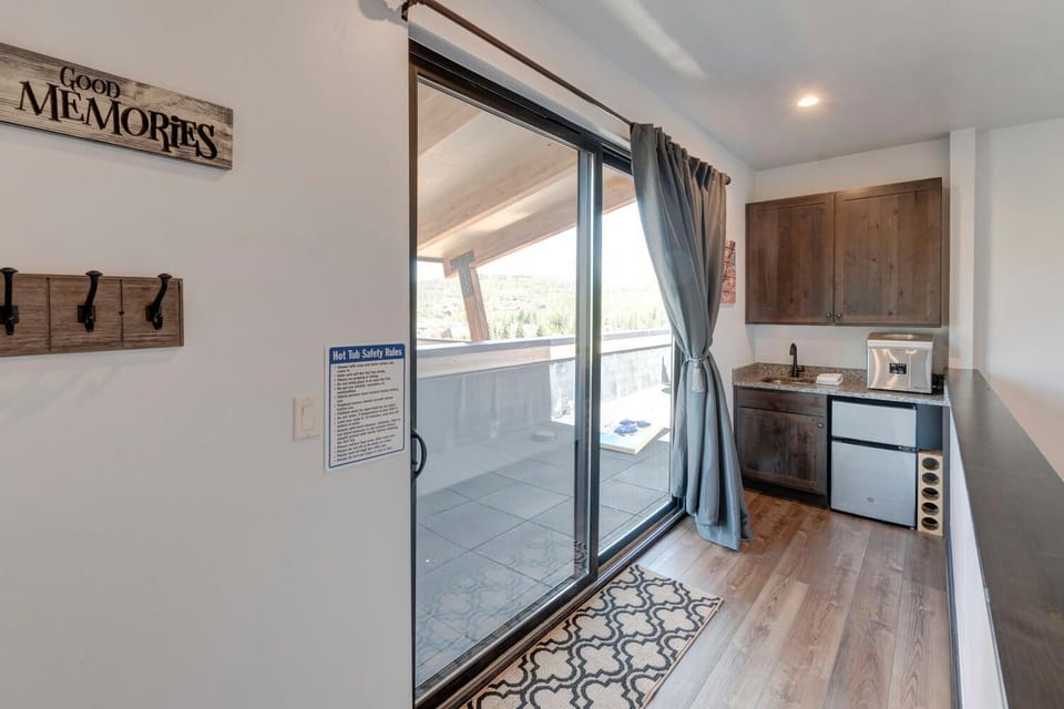 Wet Bar Next to the Sliding Door to the Balcony.