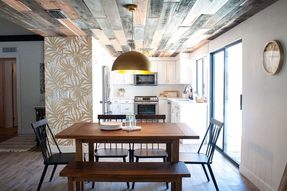 Kitchen with reclaimed wood ceilings fully stocked