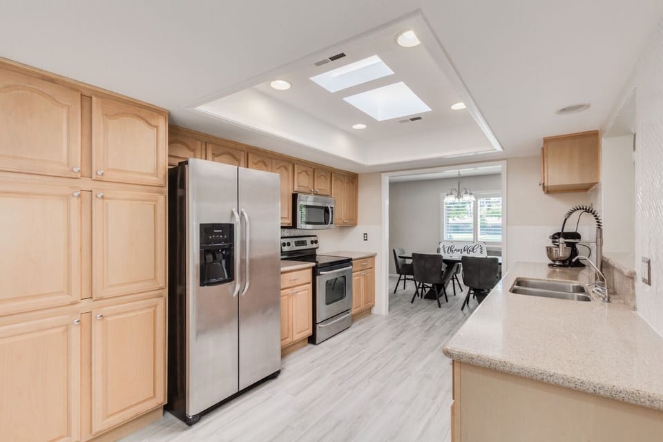 Beautifully updated kitchen with skylight adds lots of  extra light.